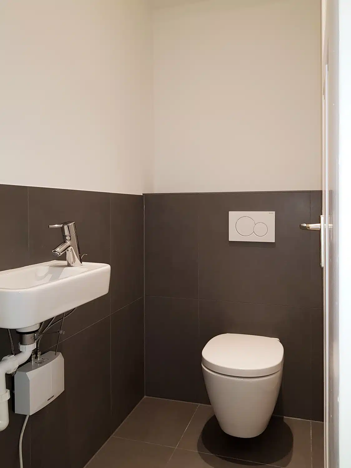 Das neue Gäste-WC nach der Renovierung - Nachherbild